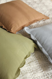 Scallop Cushion In Soft Olive